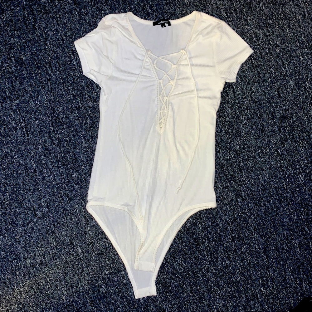 Criss-cross body suit